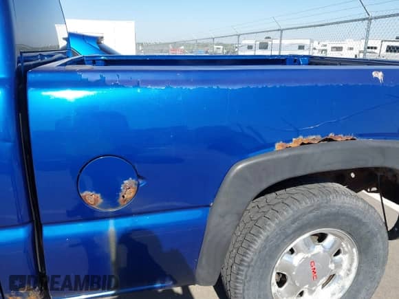 2003 GMC Sierra 1500 SLT z VIN 1GTEK19T93E376805, wystawiony jako IAAI lot #42238370 z przebiegiem 245 948 mil mil oraz . Historia ofert i sprzedaży dostępna na DreamBid. Obrazek 14.