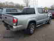 2021 Toyota Tacoma Limited with VIN 3TMGZ5ANXMM421920, listed as a IAAI auction lot 40852472 with 28,591 mi miles and . Bid and sale history available at DreamBid. Image 4.