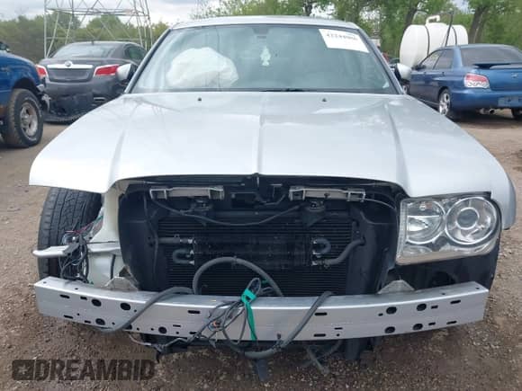 2006 Chrysler 300 C SRT-8 with VIN 2C3LA73W06H389007, listed as a IAAI auction lot 42244006 with 91,002 mi miles and . Bid and sale history available at DreamBid. Image 13.