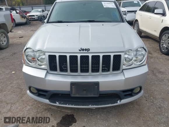 2006 Jeep Grand Cherokee SRT-8 with VIN 1J8HR78316C341911, listed as a IAAI auction lot 43580619 with 146,360 mi miles and . Bid and sale history available at DreamBid. Image 6.