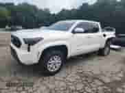 2024 Toyota Tacoma SR5 with VIN 3TYLB5JN2RT035281, listed as a Copart auction lot 69350095 with 9,907 mi miles and Salvage title. Bid and sale history available at DreamBid. Image 1.