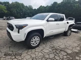 2024 Toyota Tacoma SR5 with VIN 3TYLB5JN2RT035281, listed as a Copart auction lot 69350095 with 9,907 mi miles and Salvage title. Bid and sale history available at DreamBid. Image 1.