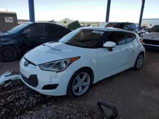 2013 Hyundai Veloster w/Black Int z VIN KMHTC6AD5DU147868, wystawiony jako Copart lot #81929665 z przebiegiem 139 774 mil mil oraz Czysty tytuł • Clean title. Historia ofert i sprzedaży dostępna na DreamBid. Obrazek 1.