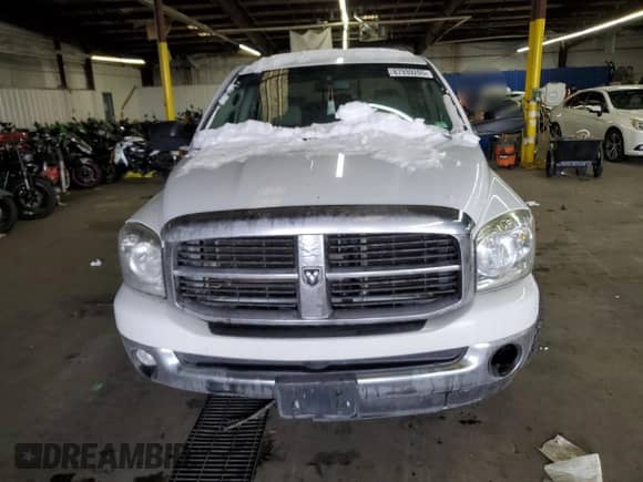 2007 Dodge 1500 SLT z VIN 3D7KR19D07G833903, wystawiony jako Copart lot #87939265 z przebiegiem 229 748 mil mil oraz Szkoda całkowita • Salvage title. Historia ofert i sprzedaży dostępna na DreamBid. Obrazek 5.