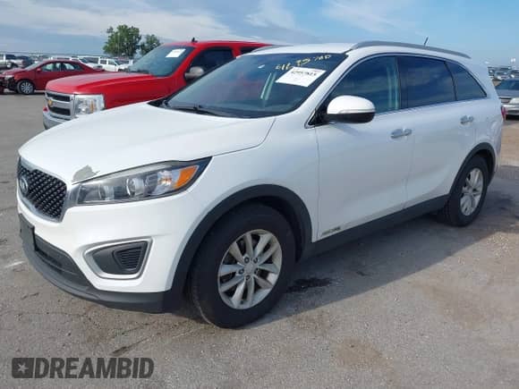 2017 Kia Sorento LX with VIN 5XYPGDA57HG329392, listed as a IAAI auction lot 42957815 with 194,503 mi miles and . Bid and sale history available at DreamBid. Image 2.