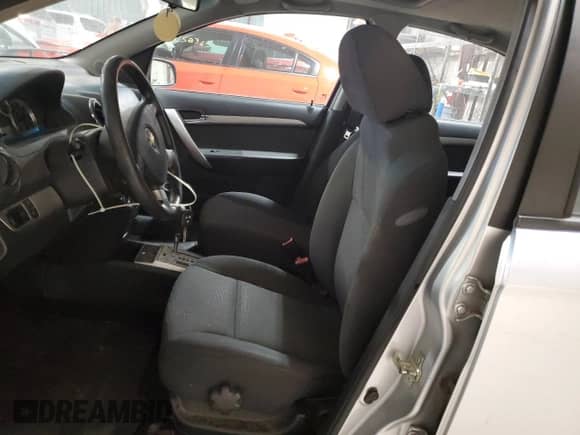 2011 Chevrolet Aveo 2LT with VIN KL1TG5DE3BB207704, listed as a Copart auction lot 71665845 with 97,479 mi miles and Salvage title. Bid and sale history available at DreamBid. Image 7.