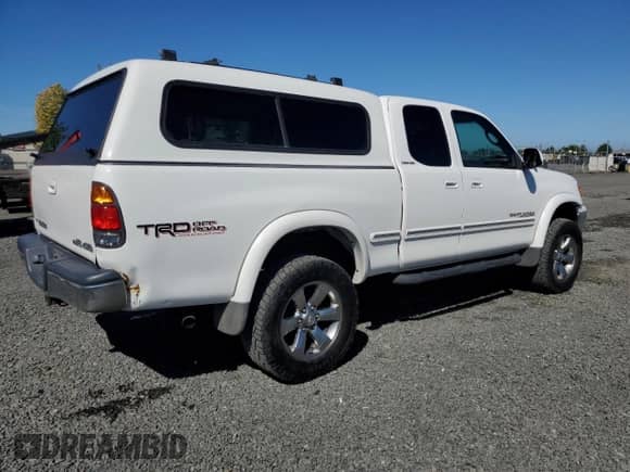 2001 Toyota Tundra Limited z VIN 5TBBT48191S126028, wystawiony jako Copart lot #80312915 z przebiegiem 230 773 mil mil oraz Czysty tytuł • Clean title. Historia ofert i sprzedaży dostępna na DreamBid. Obrazek 3.