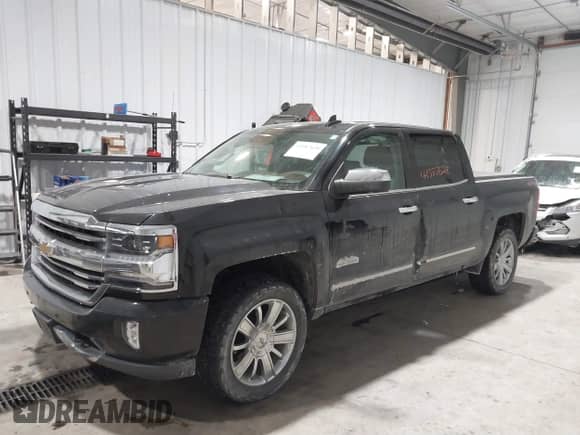 2016 Chevrolet Silverado 1500 High Country с VIN 3GCUKTEC8GG221707, выставлен на аукционе IAAI как лот 41587628 с пробегом 63 740 миль миль и . История ставок и продаж доступна на DreamBid. Изображение 2.