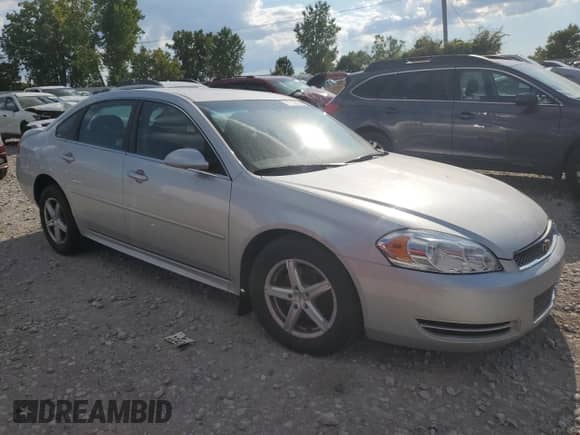 2013 Chevrolet Impala LT с VIN 2G1WB5E37D1162893, выставлен на аукционе Copart как лот 70104165 с пробегом 92 978 миль миль и Чистый • Clean title. История ставок и продаж доступна на DreamBid. Изображение 4.