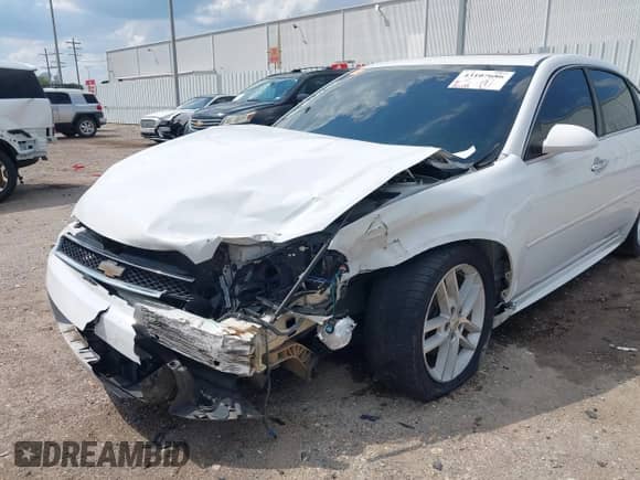 2012 Chevrolet Impala LTZ with VIN 2G1WC5E30C1138334, listed as a IAAI auction lot 43107686 with 193,149 mi miles and . Bid and sale history available at DreamBid. Image 6.