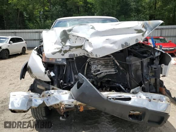 2007 Chevrolet Silverado 2500HD Work Truck z VIN 1GCHC24U47E137765, wystawiony jako Copart lot #58523585 z przebiegiem Nie podano mil oraz Szkoda całkowita • Salvage title. Historia ofert i sprzedaży dostępna na DreamBid. Obrazek 5.