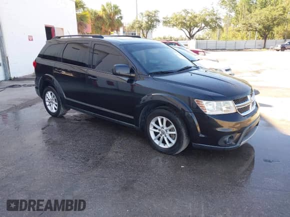 2013 Dodge Journey SXT z VIN 3C4PDCBB6DT576445, wystawiony jako IAAI lot #43317291 z przebiegiem 172 498 mil mil oraz . Historia ofert i sprzedaży dostępna na DreamBid. Obrazek 1.