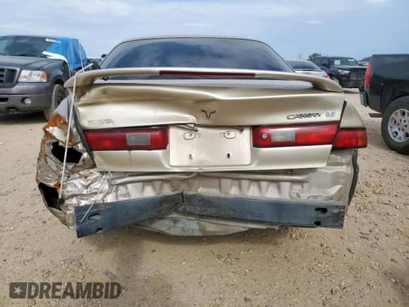 1997 Toyota Camry LE с VIN 4T1BG22K5VU081927, выставлен на аукционе Copart как лот 70648635 с пробегом 87 953 миль миль и Списание • Salvage title. История ставок и продаж доступна на DreamBid. Изображение 6.