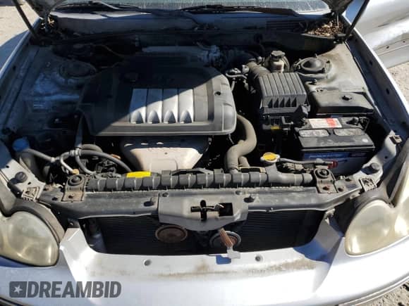 2003 Hyundai Sonata with VIN KMHWF25SX3A818800, listed as a Copart auction lot 82638495 with 127,008 mi miles and Salvage title. Bid and sale history available at DreamBid. Image 11.