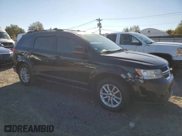 2014 Dodge Journey SXT with VIN 3C4PDCBB6ET174507, listed as a Copart auction lot 87109725 with 210,757 mi miles and Clean title. Bid and sale history available at DreamBid. Image 4.