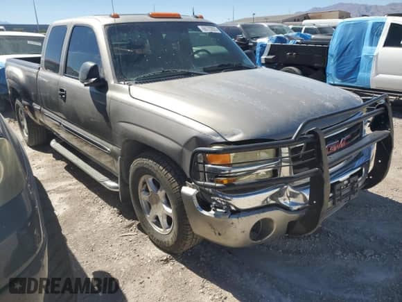 2003 GMC Sierra 1500 SLE with VIN 2GTEC19T731131936, listed as a Copart auction lot 66722825 with 189,340 mi miles and Salvage title. Bid and sale history available at DreamBid. Image 4.