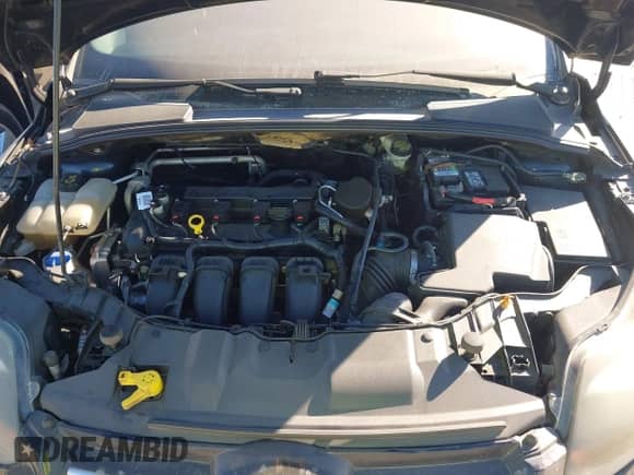 2014 Ford Focus Titanium z VIN 1FADP3J27EL227311, wystawiony jako IAAI lot #43457393 z przebiegiem 184 672 mil mil oraz . Historia ofert i sprzedaży dostępna na DreamBid. Obrazek 10.