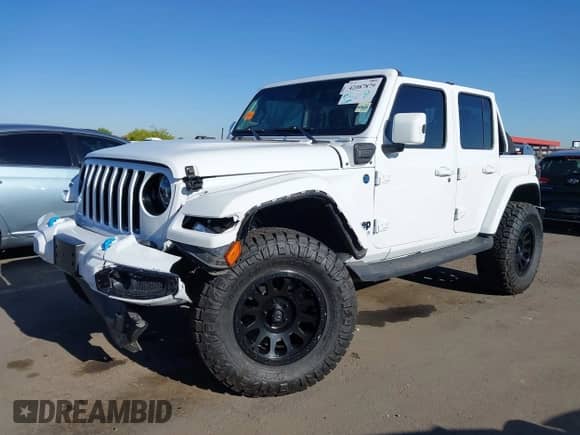 2021 Jeep Wrangler Unlimited Sahara z VIN 1C4JJXP63MW716690, wystawiony jako IAAI lot #42087879 z przebiegiem 40 889 mil mil oraz . Historia ofert i sprzedaży dostępna na DreamBid. Obrazek 6.