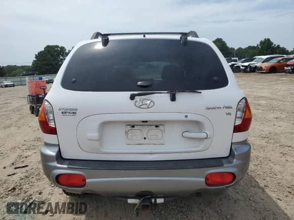 2003 Hyundai Santa Fe GLS с VIN KM8SC13D43U432684, выставлен на аукционе Copart как лот 65950054 с пробегом Не указан миль и Списание • Salvage title. История ставок и продаж доступна на DreamBid. Изображение 6.