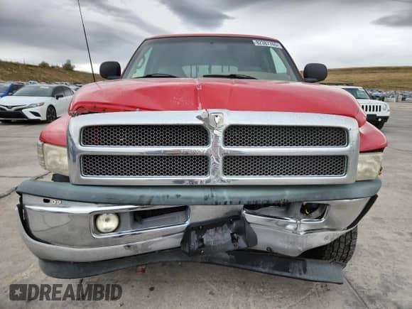 1999 Dodge 2500 with VIN 3B7KF2369XG110957, listed as a Copart auction lot 82387765 with 221,505 mi miles and Salvage title. Bid and sale history available at DreamBid. Image 5.