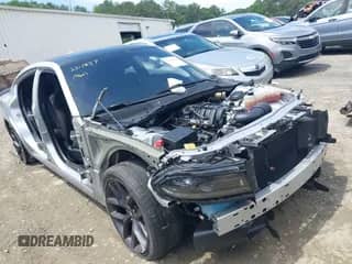 2023 Dodge Charger R/T with VIN 2C3CDXCT5PH536145, listed as a IAAI auction lot 42480508 with 85,224 mi miles and . Bid and sale history available at DreamBid. Image 1.