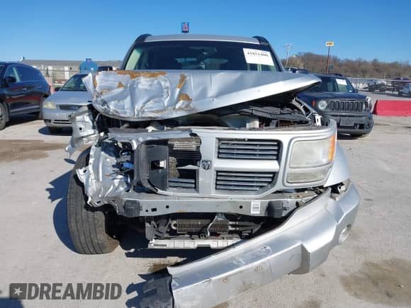 2010 Dodge Nitro Heat with VIN 1D4PU4GK4AW157565, listed as a IAAI auction lot 41851400 with 209,535 mi miles and . Bid and sale history available at DreamBid. Image 12.