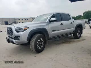 2023 Toyota Tacoma SR z VIN 3TYCZ5AN8PT165641, wystawiony jako Copart lot #53270315 z przebiegiem 66 284 mil mil oraz Szkoda całkowita • Salvage title. Historia ofert i sprzedaży dostępna na DreamBid. Obrazek 1.