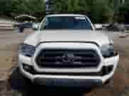 2022 Toyota Tacoma SR5 with VIN 3TMAZ5CN3NM184188, listed as a Copart auction lot 80107995 with 67,428 mi miles and Salvage title. Bid and sale history available at DreamBid. Image 5.