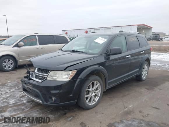 2011 Dodge Journey Crew with VIN 3D4PH3FG9BT530313, listed as a IAAI auction lot 41391445 with 144,698 mi miles and . Bid and sale history available at DreamBid. Image 2.