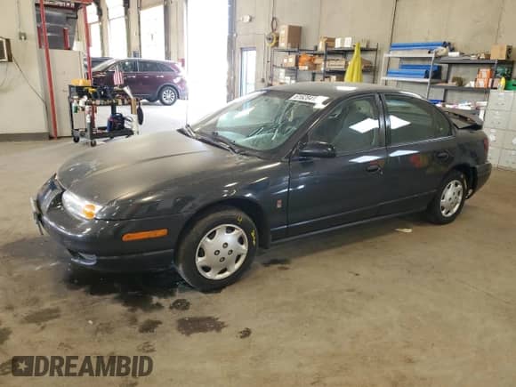 2002 Saturn SL с VIN 1G8ZH52812Z300140, выставлен на аукционе Copart как лот 61628415 с пробегом 133 340 миль миль и Списание • Salvage title. История ставок и продаж доступна на DreamBid. Изображение 1.