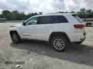 2021 Jeep Grand Cherokee Laredo E with VIN 1C4RJFAG9MC731727, listed as a Copart auction lot 69651455 with 33,180 mi miles and Salvage title. Bid and sale history available at DreamBid. Image 2.