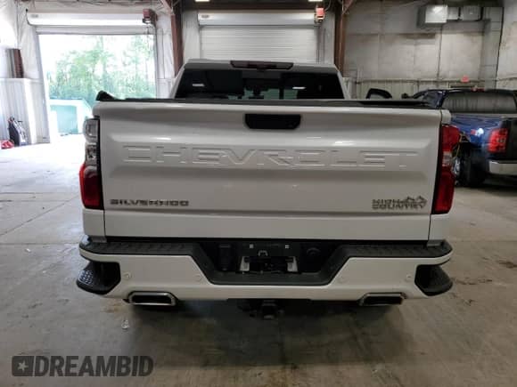 2021 Chevrolet Silverado 1500 High Country with VIN 1GCUYHEL7MZ255063, listed as a Copart auction lot 64203335 with 103,889 mi miles and Salvage title. Bid and sale history available at DreamBid. Image 6.