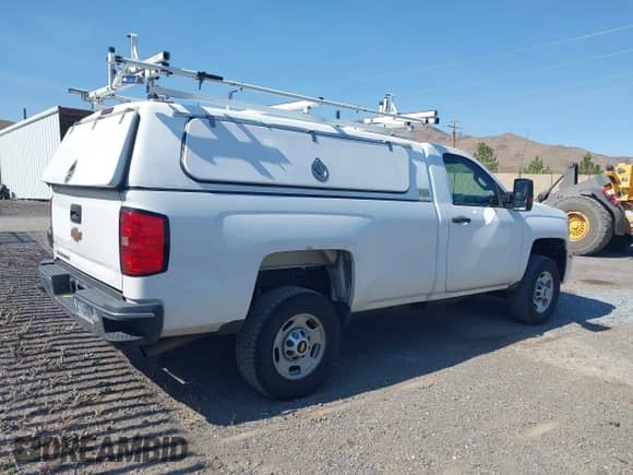 2015 Chevrolet Silverado 2500HD Work Truck with VIN 1GC0KUEG3FZ531558, listed as a IAAI auction lot 43226136 with 241,382 mi miles and . Bid and sale history available at DreamBid. Image 4.