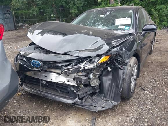 2022 Toyota Camry Hybrid LE with VIN 4T1C31AK3NU570645, listed as a IAAI auction lot 42659916 with 19,420 mi miles and . Bid and sale history available at DreamBid. Image 12.