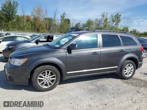 2017 Dodge Journey SXT with VIN 3C4PDDBG1HT591779, listed as a Copart auction lot 80312965 with 107,330 mi miles and Salvage title. Bid and sale history available at DreamBid. Image 1.
