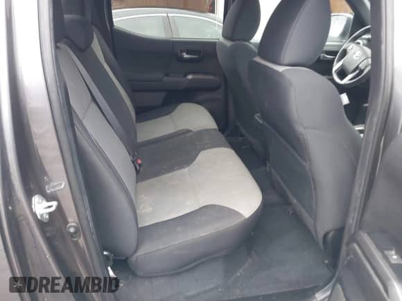 2022 Toyota Tacoma SR5 z VIN 3TYDZ5BN1NT017041, wystawiony jako IAAI lot #41475501 z przebiegiem 39 460 mil mil oraz . Historia ofert i sprzedaży dostępna na DreamBid. Obrazek 8.