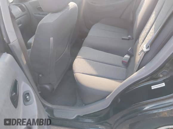 2005 Hyundai Accent GLS z VIN KMHCG45C55U587584, wystawiony jako IAAI lot #42864972 z przebiegiem 122 849 mil mil oraz . Historia ofert i sprzedaży dostępna na DreamBid. Obrazek 8.