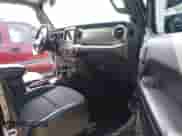 2021 Jeep Wrangler Unlimited Sport Altitude with VIN 1C4HJXDN5MW670810, listed as a IAAI auction lot 42562339 with 136,697 mi miles and . Bid and sale history available at DreamBid. Image 5.