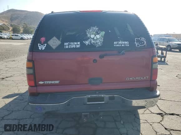 2004 Chevrolet Tahoe LS with VIN 1GNEC13T44R294049, listed as a Copart auction lot 59900565 with 149,379 mi miles and Salvage title. Bid and sale history available at DreamBid. Image 6.