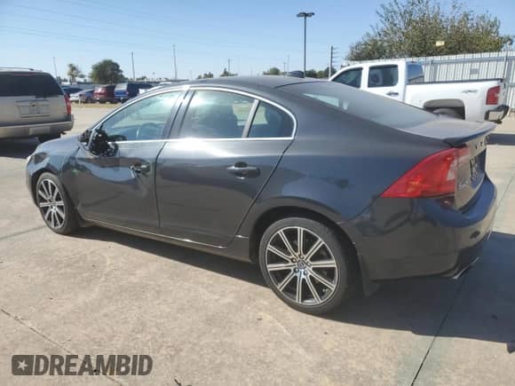 2015 Volvo S60 with VIN YV126MFD0F1309666, listed as a Copart auction lot 77844894 with 130,570 mi miles and Salvage title. Bid and sale history available at DreamBid. Image 2.