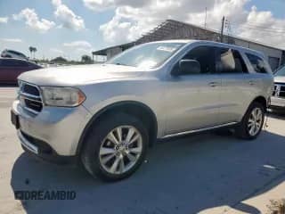 2012 Dodge Durango SXT with VIN 1C4RDHAG5CC321718, listed as a Copart auction lot 68470685 with 117,403 mi miles and Salvage title. Bid and sale history available at DreamBid. Image 1.
