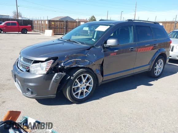 2014 Dodge Journey SXT with VIN 3C4PDDBG8ET214636, listed as a IAAI auction lot 41651140 with 141,742 mi miles and . Bid and sale history available at DreamBid. Image 2.