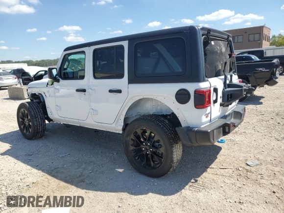2023 Jeep Wrangler Sahara with VIN 1C4JJXP69PW555542, listed as a Copart auction lot 70154975 with 38,720 mi miles and Salvage title. Bid and sale history available at DreamBid. Image 2.