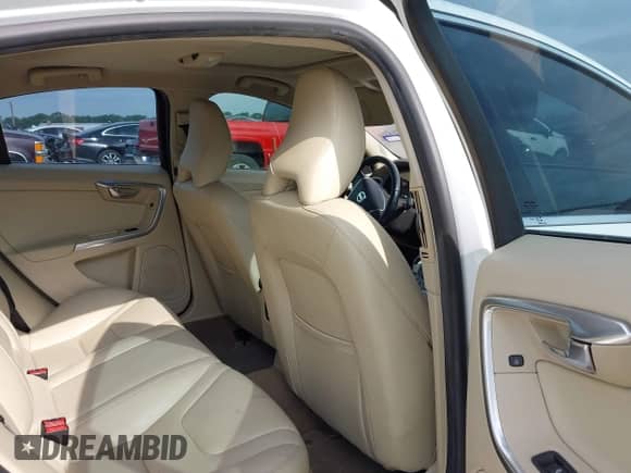 2015 Volvo S60 T5 Drive-E Premier with VIN YV126MFB8F1305105, listed as a IAAI auction lot 42566641 with 115,535 mi miles and . Bid and sale history available at DreamBid. Image 8.