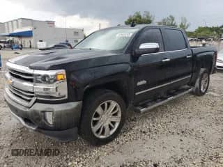 2018 Chevrolet Silverado 1500 High Country с VIN 3GCPCTEC0JG614392, выставлен на аукционе Copart как лот 69685245 с пробегом 97 963 миль миль и Списание • Salvage title. История ставок и продаж доступна на DreamBid. Изображение 1.