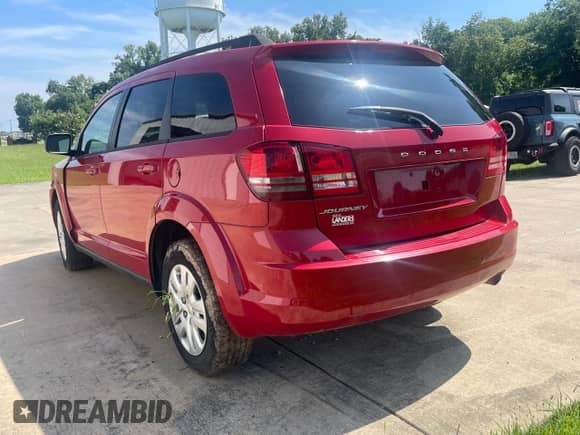 2016 Dodge Journey SE with VIN 3C4PDCAB2GT138477, listed as a Copart auction lot 65190885 with 230,116 mi miles and Clean title. Bid and sale history available at DreamBid. Image 3.