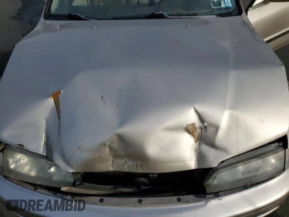 1994 Honda Accord LX z VIN 1HGCD5635RA177586, wystawiony jako Copart lot #85331804 z przebiegiem 113 195 mil mil oraz Szkoda całkowita • Salvage title. Historia ofert i sprzedaży dostępna na DreamBid. Obrazek 11.