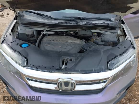 2019 Honda Pilot LX z VIN 5FNYF5H14KB016721, wystawiony jako IAAI lot #43139136 z przebiegiem 111 555 mil mil oraz . Historia ofert i sprzedaży dostępna na DreamBid. Obrazek 18.