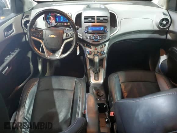 2012 Chevrolet Sonic LTZ с VIN 1G1JE6SH4C4112110, выставлен на аукционе Copart как лот 51121065 с пробегом 141 985 миль миль и Списание • Salvage title. История ставок и продаж доступна на DreamBid. Изображение 8.