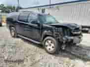 2009 Chevrolet Suburban 2LT with VIN 1GNFC26089R188805, listed as a Copart auction lot 70136265 with 180,613 mi miles and Salvage title. Bid and sale history available at DreamBid. Image 4.